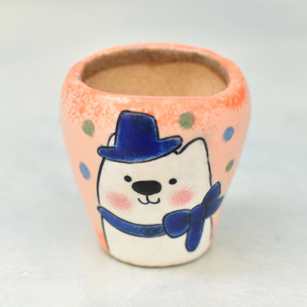 Hand Painted Orange Ceramic Succulent Pot with Stylish Polar Bear Approximately 2"