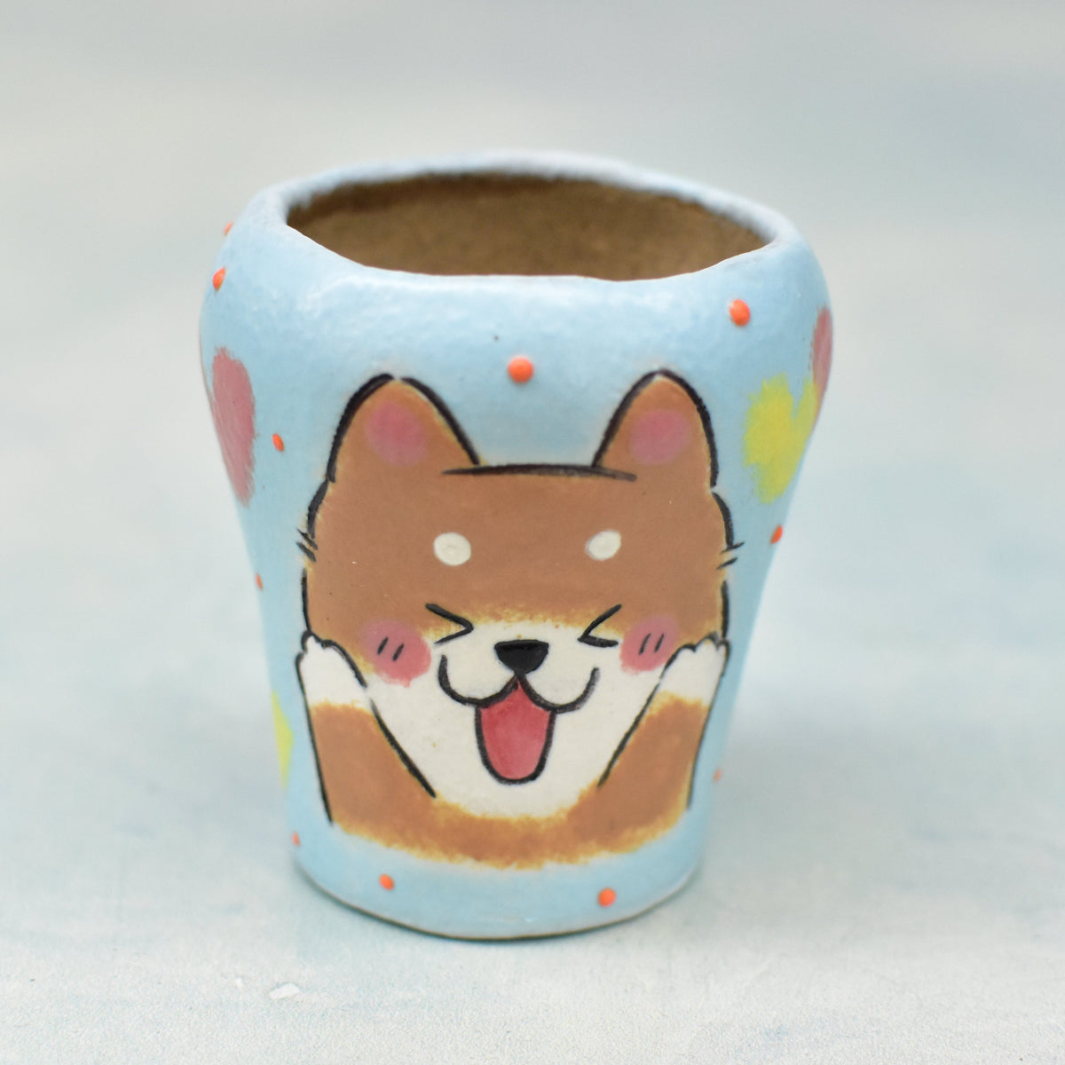 Hand Painted Blue Ceramic Succulent Pot with Excited Dog Approximately 2"