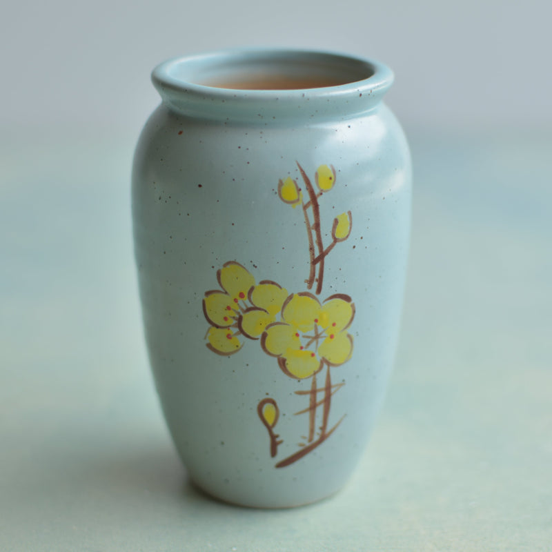 Light Blue Ceramic Succulent Pot with Yellow Flower Design Approximately 2"