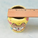 Hand Painted Yello Ceramic Succulent Pot with Blushing Dog Approximately 2"