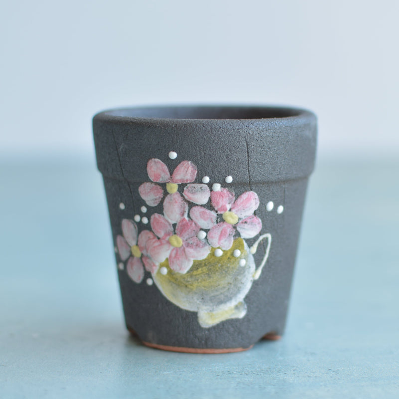 Small Black Handmade Ceramic Succulent Pot with Pink Flowers in Pot Approximately 2"