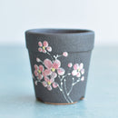 Small Black Handmade Ceramic Succulent Pot with Pink Flowers Approximately 2"